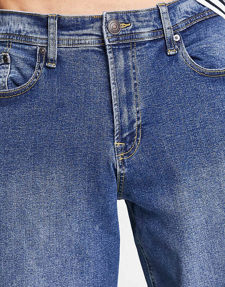 https://images.asos-media.com/products/adpt-wide-fit-jean-in-mid-blue-wash/203798944-4?$n_750w$&wid=750&fit=constrain