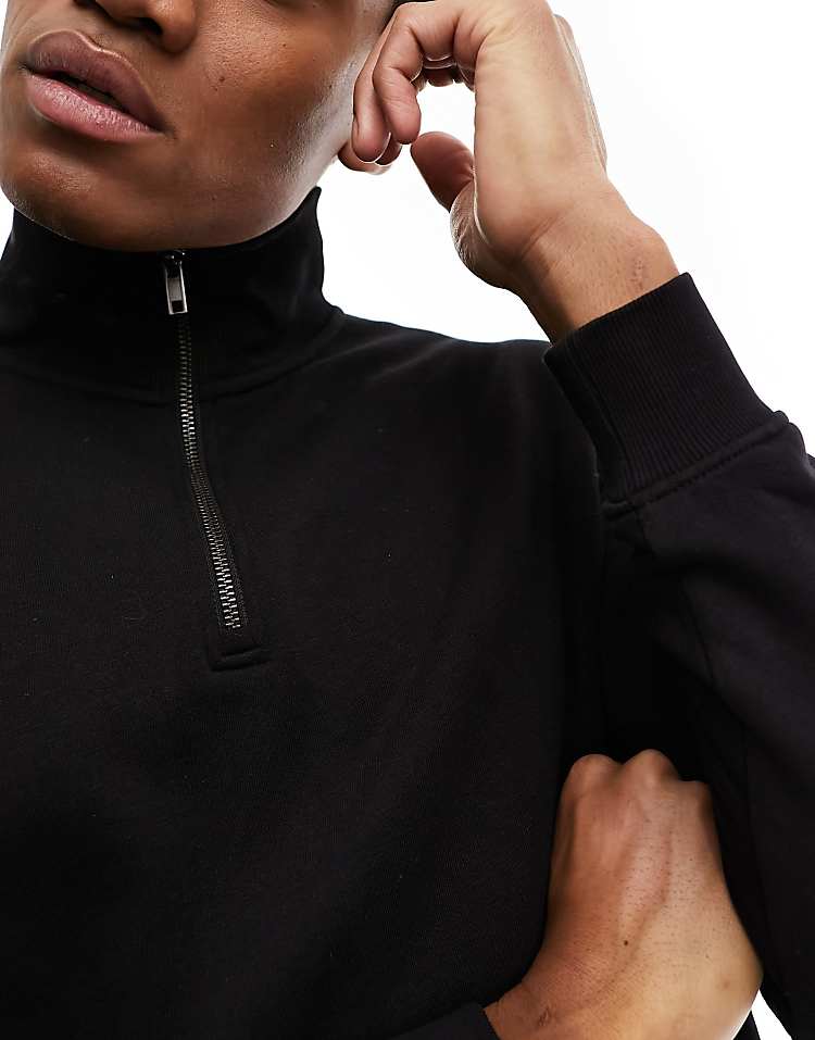 https://images.asos-media.com/products/jack-jones-relaxed-fit-quarter-zip-sweat/205502210-4?$n_750w$&wid=750&fit=constrain