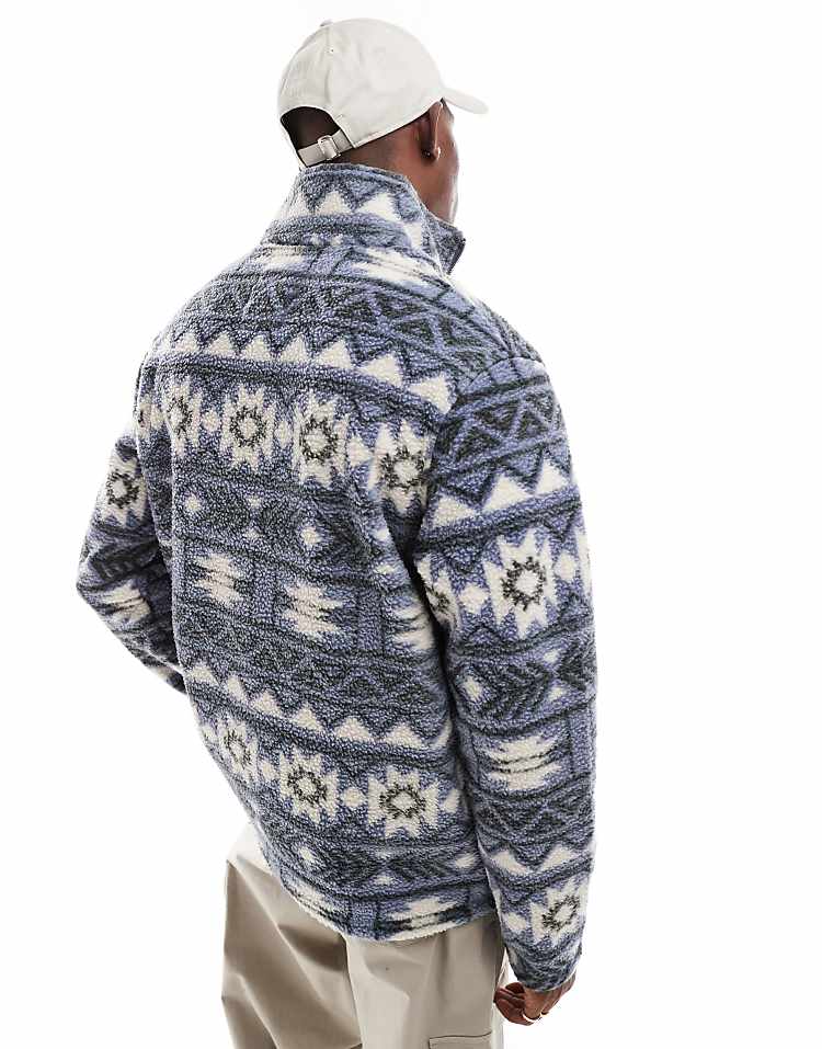 https://images.asos-media.com/products/jack-jones-aztec-printed-fleece-quarter-zip-in-blue/206910305-4?$n_750w$&wid=750&fit=constrain