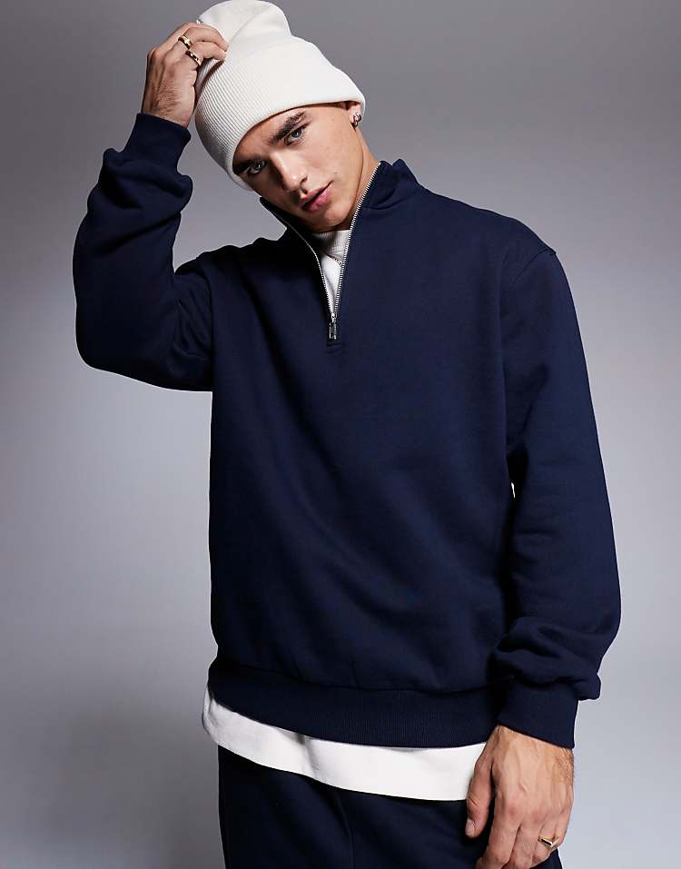 https://images.asos-media.com/products/asos-design-premium-heavyweight-oversized-quarter-zip-sweatshirt-400gsm-in-navy/207026341-1-skycaptain?$n_750w$&wid=750&fit=constrain
