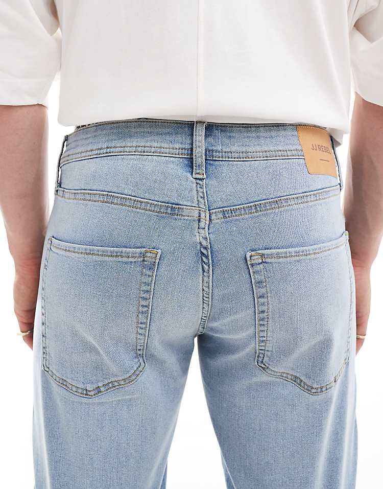 https://images.asos-media.com/products/jj-rebel-adam-tapered-jeans-in-light-blue-wash/207150555-4?$n_750w$&wid=750&fit=constrain
