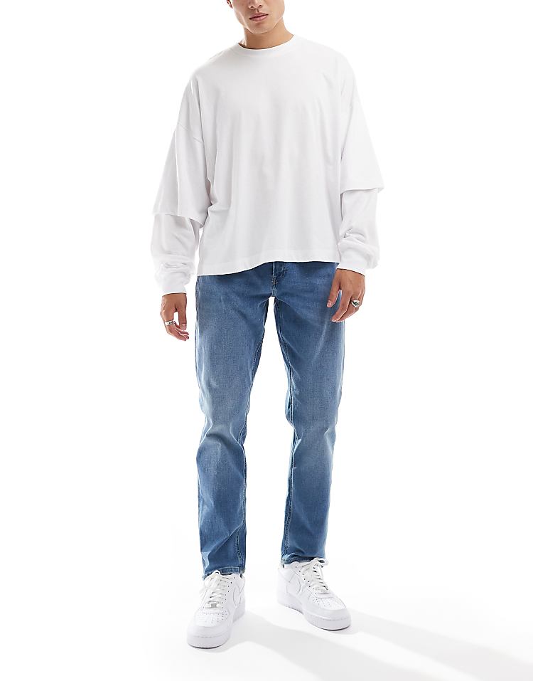 https://images.asos-media.com/products/jj-rebel-adam-tapered-jeans-in-mid-blue-wash/207150681-1-bluedenim?$n_750w$&wid=750&fit=constrain