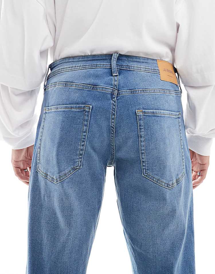 https://images.asos-media.com/products/jj-rebel-adam-tapered-jeans-in-mid-blue-wash/207150681-5?$n_750w$&wid=750&fit=constrain