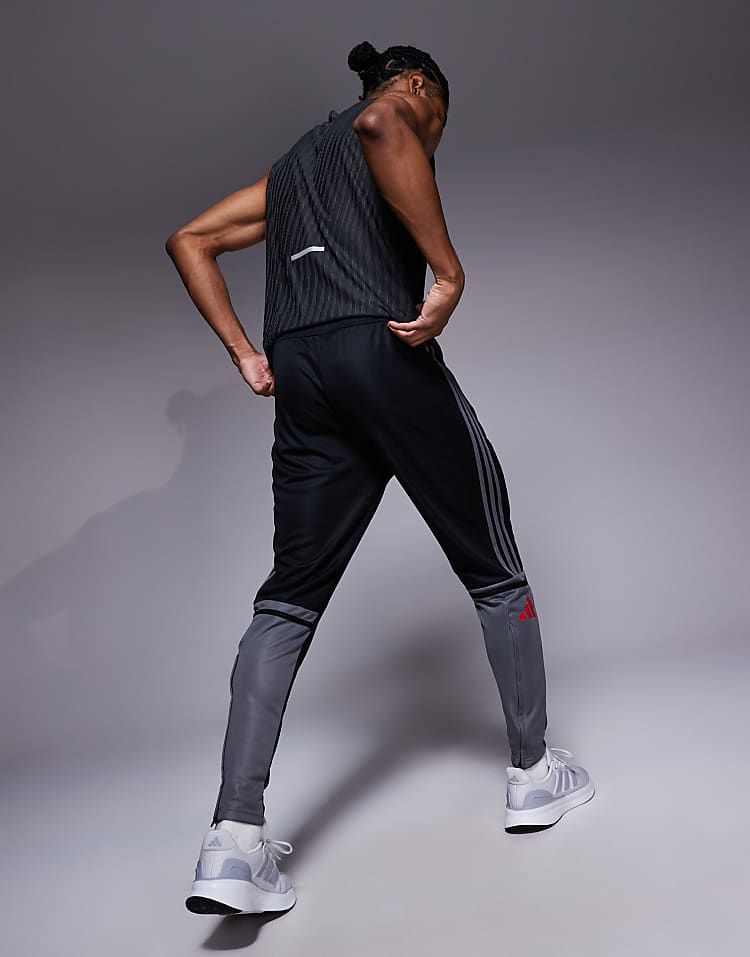https://images.asos-media.com/products/adidas-football-squadra-joggers-in-black-and-red/208044942-3?$n_750w$&wid=750&fit=constrain