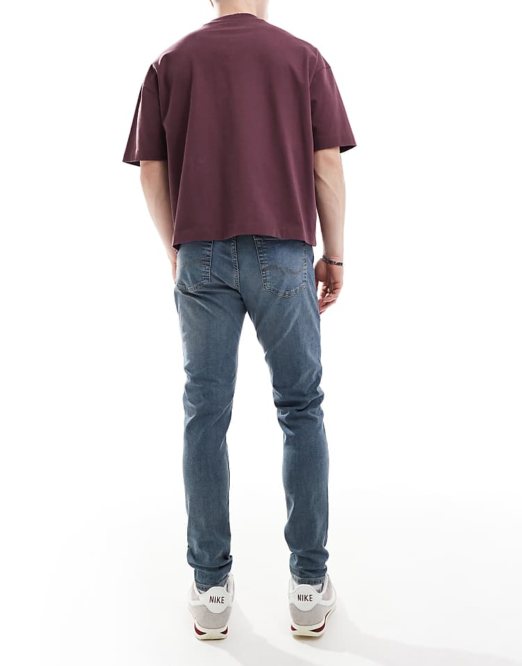 https://images.asos-media.com/products/jack-jones-pete-tapered-jeans-in-vintage-blue/208222570-3?$n_750w$&wid=750&fit=constrain