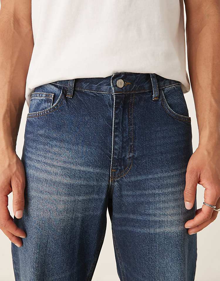 https://images.asos-media.com/products/asos-design-wide-flare-jeans-with-tint-in-dark-wash-blue/208341535-5?$n_750w$&wid=750&fit=constrain