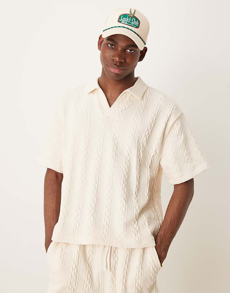 https://images.asos-media.com/products/asos-design-boxy-relaxed-polo-in-heavyweight-cream-cable-texture/208540586-1-cream?$n_750w$&wid=750&fit=constrain