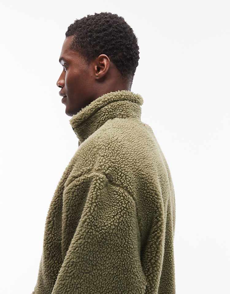 https://images.asos-media.com/products/asos-design-relaxed-funnel-neck-zip-through-borg-sweatshirt-in-green/208547808-4?$n_750w$&wid=750&fit=constrain