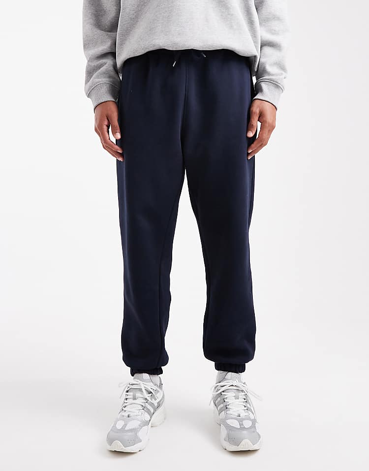 https://images.asos-media.com/products/asos-design-essentials-tapered-jogger-in-navy/208549001-1-skycaptain?$n_750w$&wid=750&fit=constrain