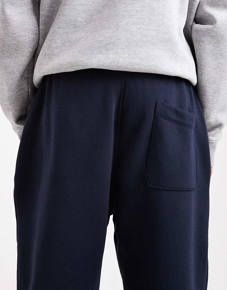 https://images.asos-media.com/products/asos-design-essentials-tapered-jogger-in-navy/208549001-4?$n_750w$&wid=750&fit=constrain