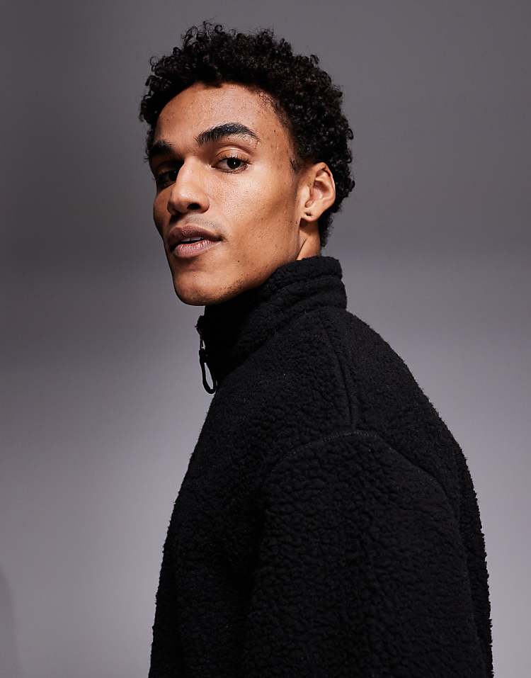 https://images.asos-media.com/products/asos-design-relaxed-funnel-neck-zip-through-borg-sweatshirt-with-piping-in-black/208549506-4?$n_750w$&wid=750&fit=constrain