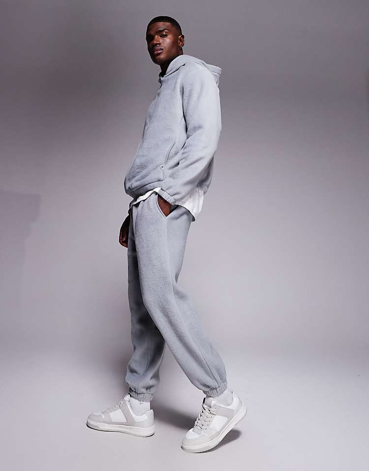 https://images.asos-media.com/products/asos-design-co-ord-tapered-fleece-jogger-in-grey/208550136-3?$n_750w$&wid=750&fit=constrain