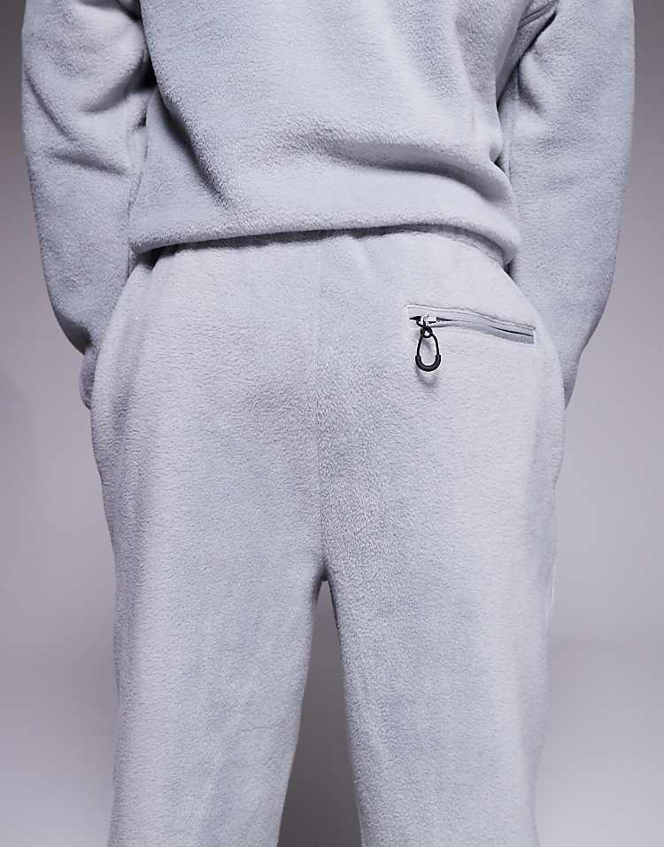 https://images.asos-media.com/products/asos-design-co-ord-tapered-fleece-jogger-in-grey/208550136-4?$n_750w$&wid=750&fit=constrain