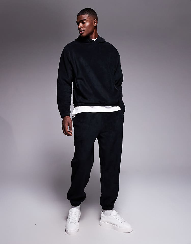 https://images.asos-media.com/products/asos-design-co-ord-tapered-fleece-jogger-in-black/208550145-2?$n_750w$&wid=750&fit=constrain