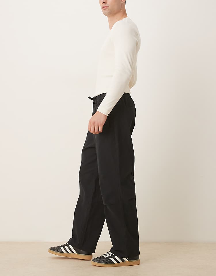https://images.asos-media.com/products/asos-design-relaxed-tapered-pull-on-trousers-in-black/208917812-3?$n_750w$&wid=750&fit=constrain
