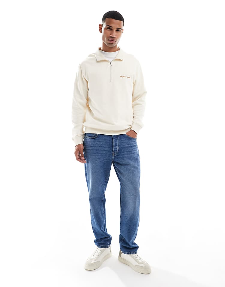 https://images.asos-media.com/products/jack-jones-relaxed-quarter-zip-sweatshirt-in-off-white/208948951-2?$n_750w$&wid=750&fit=constrain
