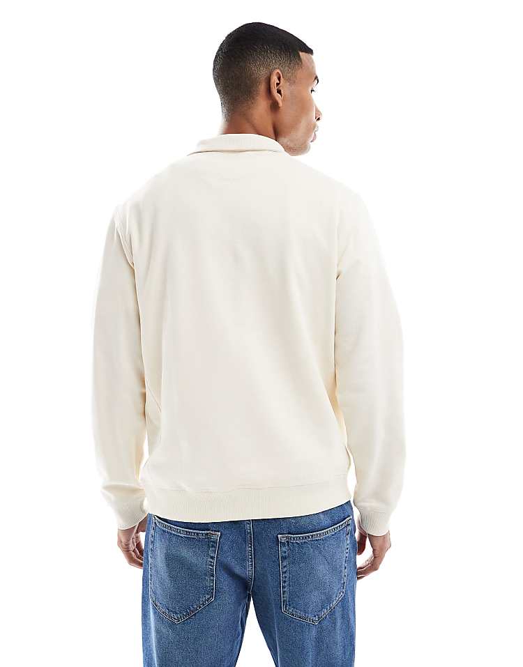 https://images.asos-media.com/products/jack-jones-relaxed-quarter-zip-sweatshirt-in-off-white/208948951-3?$n_750w$&wid=750&fit=constrain