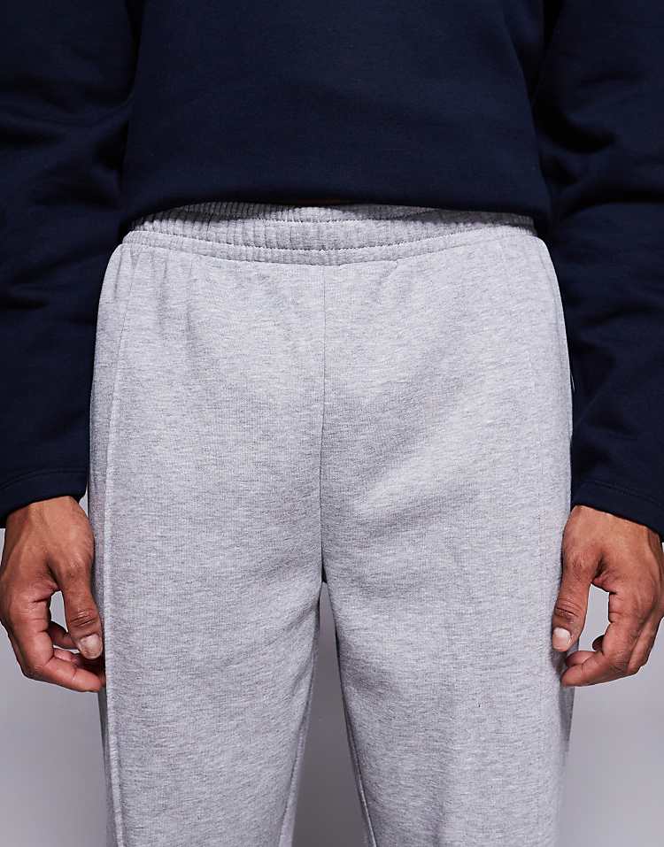 https://images.asos-media.com/products/asos-design-tapered-jogger-with-pin-tucks-in-grey-marl/209009380-5?$n_750w$&wid=750&fit=constrain