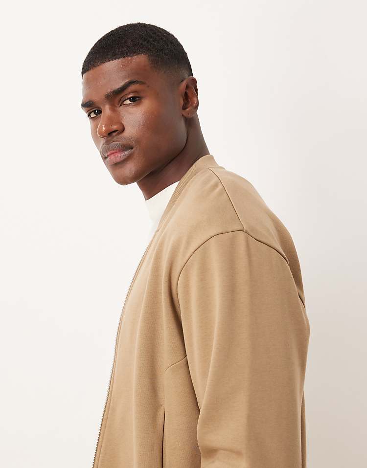 https://images.asos-media.com/products/asos-design-oversized-drop-shoulder-jersey-bomber-jacket-in-beige/209009468-4?$n_750w$&wid=750&fit=constrain