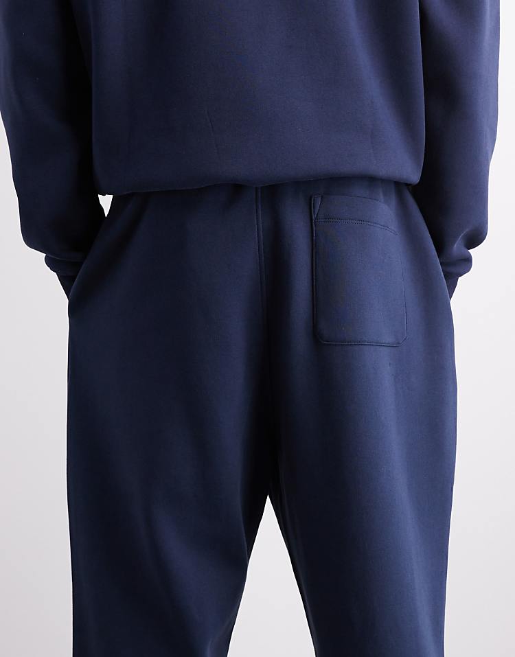 https://images.asos-media.com/products/asos-design-essentials-oversized-joggers-in-navy/209030022-4?$n_750w$&wid=750&fit=constrain