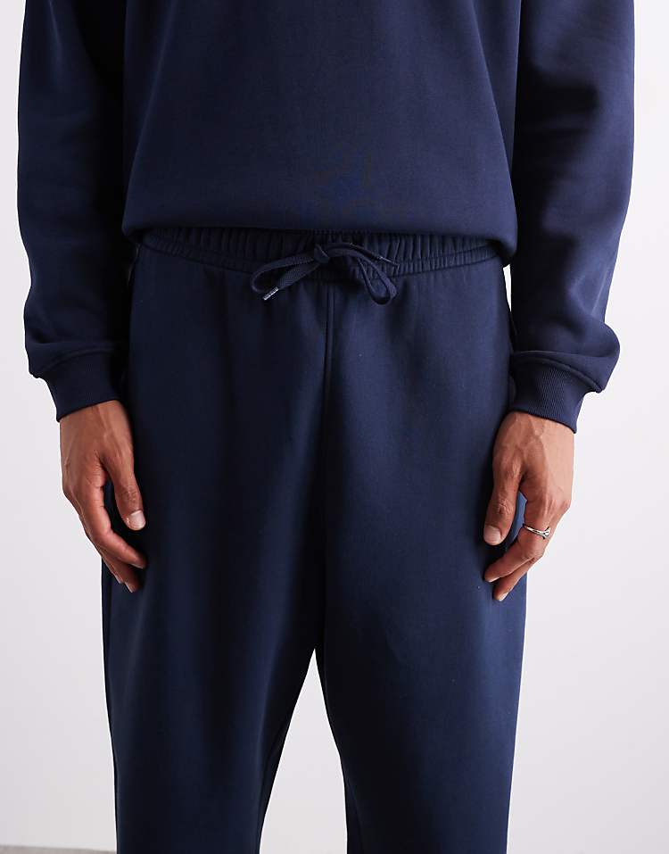 https://images.asos-media.com/products/asos-design-essentials-oversized-joggers-in-navy/209030022-5?$n_750w$&wid=750&fit=constrain