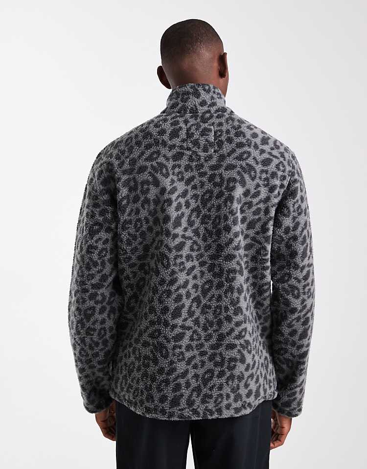 https://images.asos-media.com/products/jack-jones-1-4-zip-fleece-in-leopard/209123178-3?$n_750w$&wid=750&fit=constrain