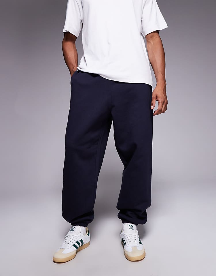 https://images.asos-media.com/products/asos-design-premium-heavyweight-oversized-jogger-in-400-gsm-navy/209283564-1-deepwell?$n_750w$&wid=750&fit=constrain