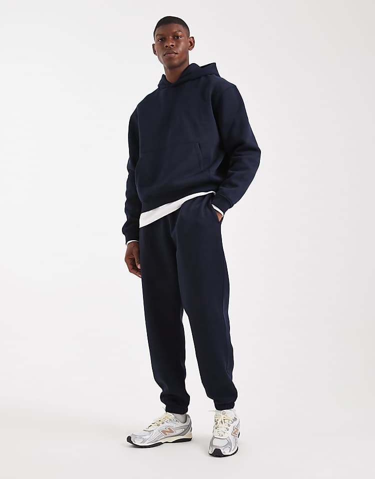 https://images.asos-media.com/products/asos-design-essentials-2-pack-tapered-jogger-in-black-and-navy/209310461-2?$n_750w$&wid=750&fit=constrain