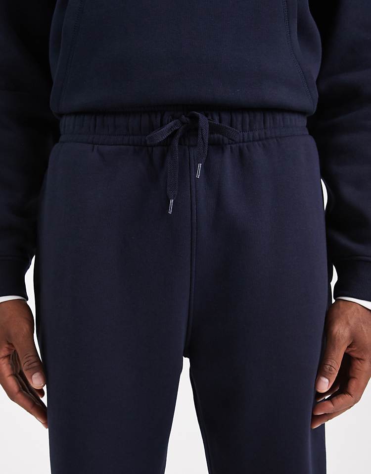 https://images.asos-media.com/products/asos-design-essentials-2-pack-tapered-jogger-in-black-and-navy/209310461-5?$n_750w$&wid=750&fit=constrain