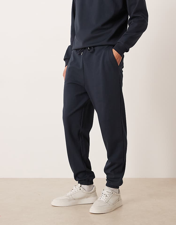 https://images.asos-media.com/products/asos-design-co-ord-breathemax-tapered-joggers-in-navy/209330921-1-skycaptain?$n_750w$&wid=750&fit=constrain