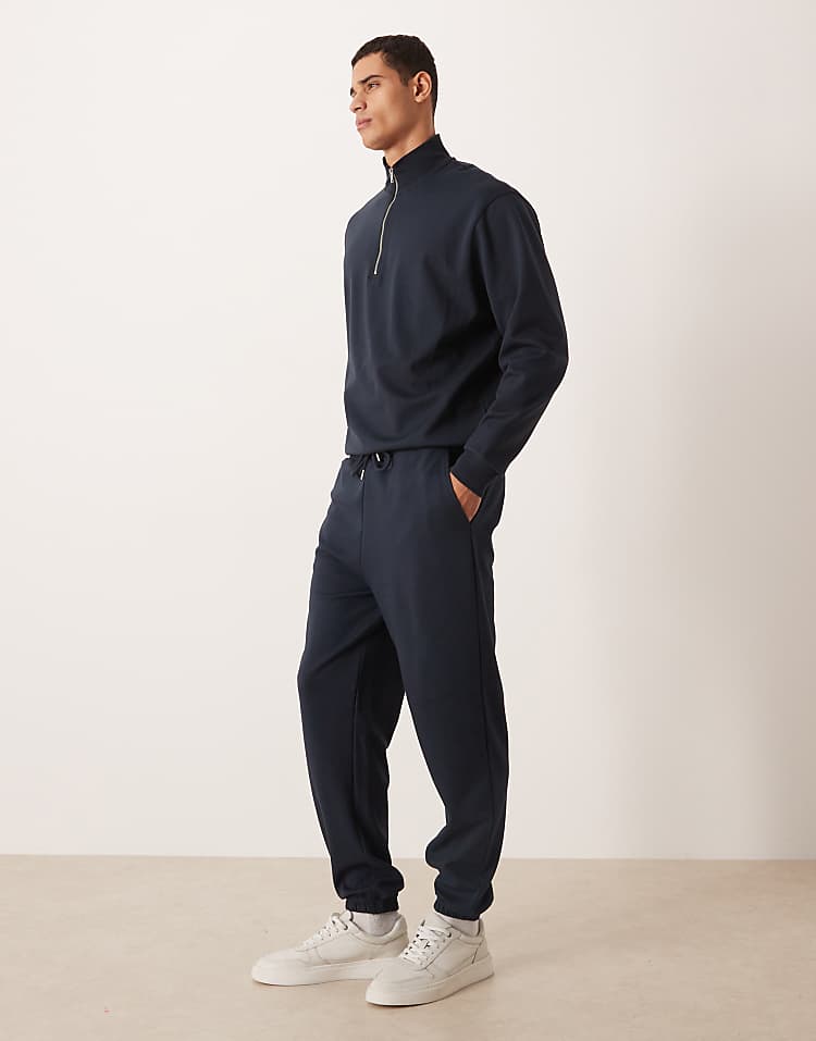 https://images.asos-media.com/products/asos-design-co-ord-breathemax-tapered-joggers-in-navy/209330921-3?$n_750w$&wid=750&fit=constrain