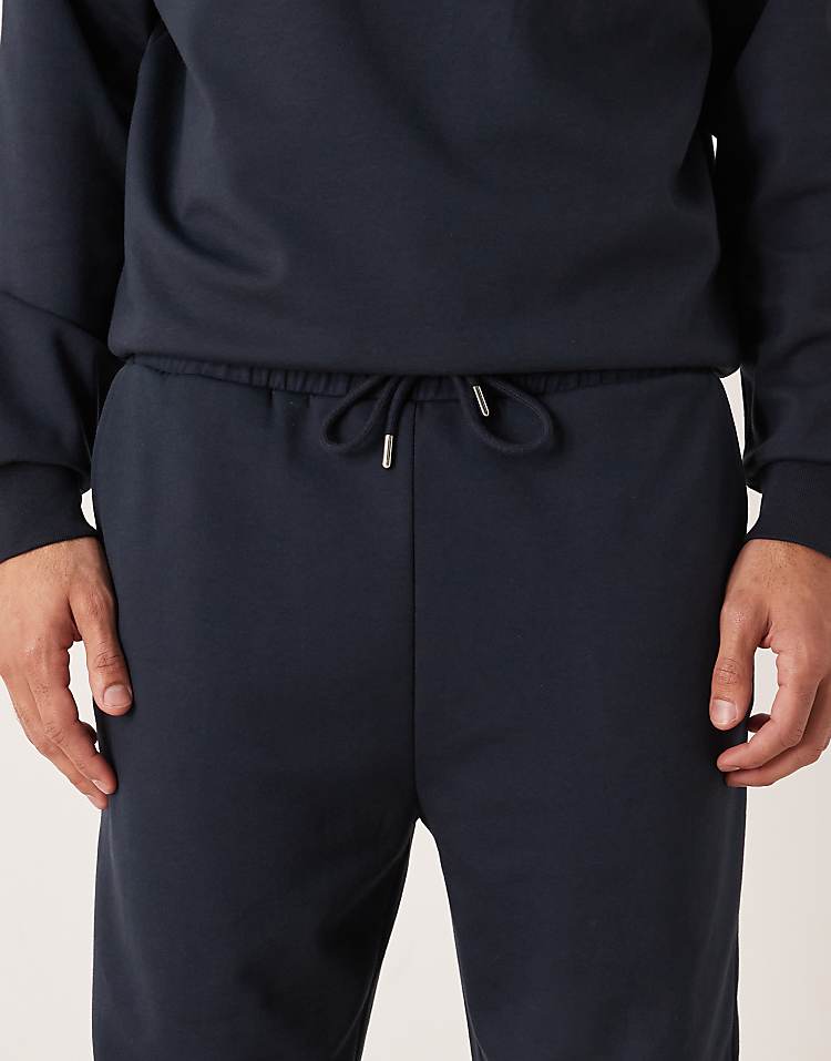 https://images.asos-media.com/products/asos-design-co-ord-breathemax-tapered-joggers-in-navy/209330921-4?$n_750w$&wid=750&fit=constrain