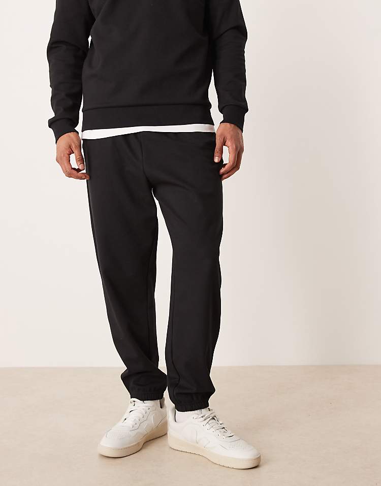 https://images.asos-media.com/products/asos-design-co-ord-breathemax-tapered-joggers-in-black/209331052-1-black?$n_750w$&wid=750&fit=constrain