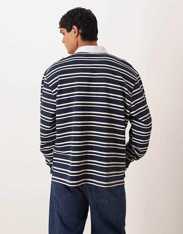 https://images.asos-media.com/products/asos-design-relaxed-fit-rugby-polo-sweatshirt-in-striped-white-and-navy/209442152-3?$n_750w$&wid=750&fit=constrain