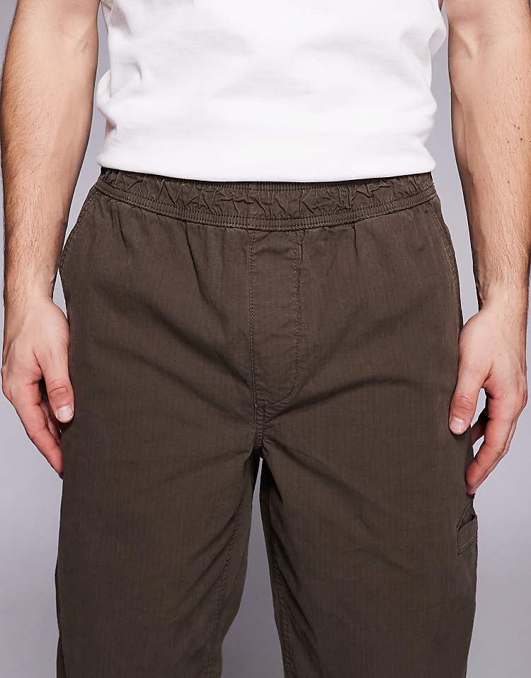 https://images.asos-media.com/products/river-island-loose-fit-pull-on-trousers-in-brown/209522876-4?$n_750w$&wid=750&fit=constrain