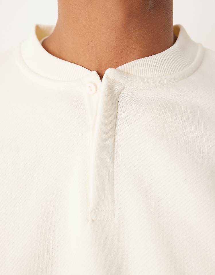 https://images.asos-media.com/products/asos-design-oversized-heavyweight-henley-sweatshirt-in-ecru/209523786-5?$n_750w$&wid=750&fit=constrain