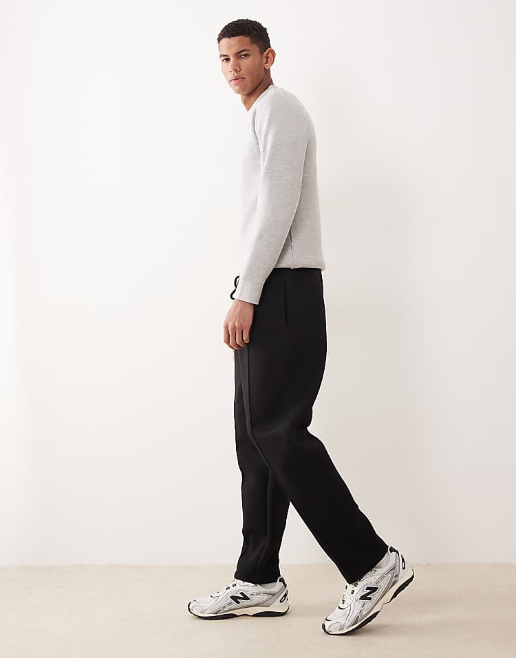 https://images.asos-media.com/products/asos-design-tapered-fit-jogger-in-scuba-style-fabric-in-black-black/209524689-3?$n_750w$&wid=750&fit=constrain