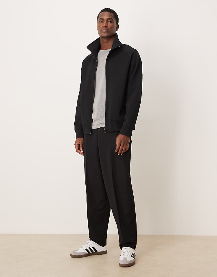 https://images.asos-media.com/products/mango-relaxed-fit-zip-through-sweatshirt-in-black/209533396-2?$n_750w$&wid=750&fit=constrain
