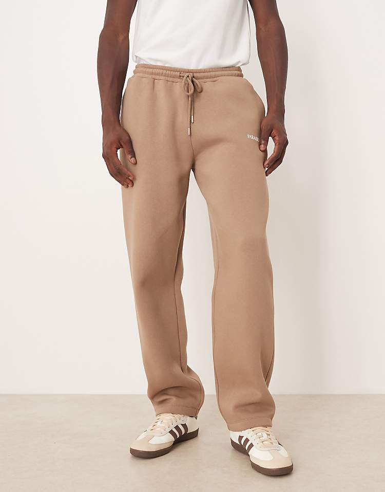 https://images.asos-media.com/products/asos-design-oversized-jogger-with-print-in-brown/209669311-1-caribou?$n_750w$&wid=750&fit=constrain