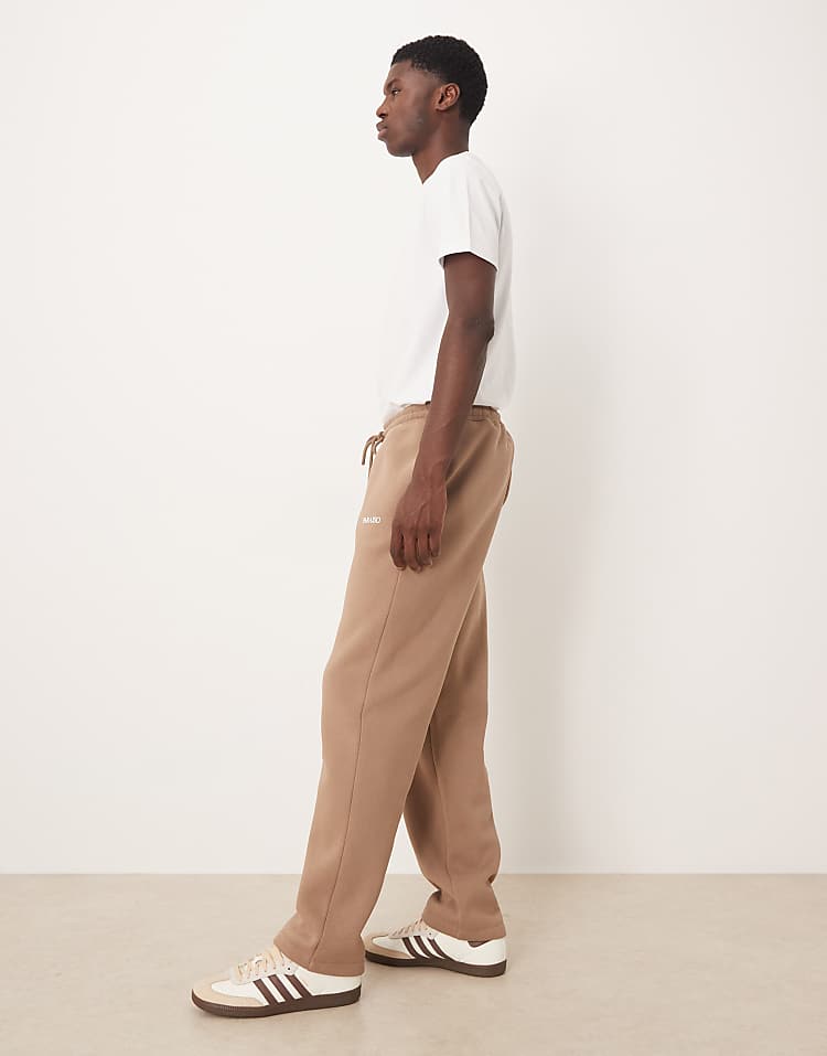 https://images.asos-media.com/products/asos-design-oversized-jogger-with-print-in-brown/209669311-3?$n_750w$&wid=750&fit=constrain