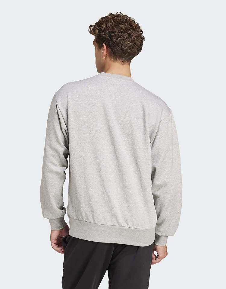 https://images.asos-media.com/products/adidas-performance-essentials-feelcozy-fleece-sweatshirt-in-medium-grey-heather-black/210012617-4?$n_750w$&wid=750&fit=constrain