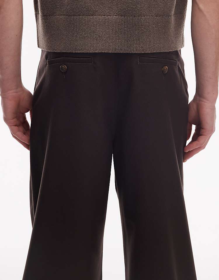 https://images.asos-media.com/products/prohibited-double-pleated-trousers-in-brown/210062740-4?$n_750w$&wid=750&fit=constrain