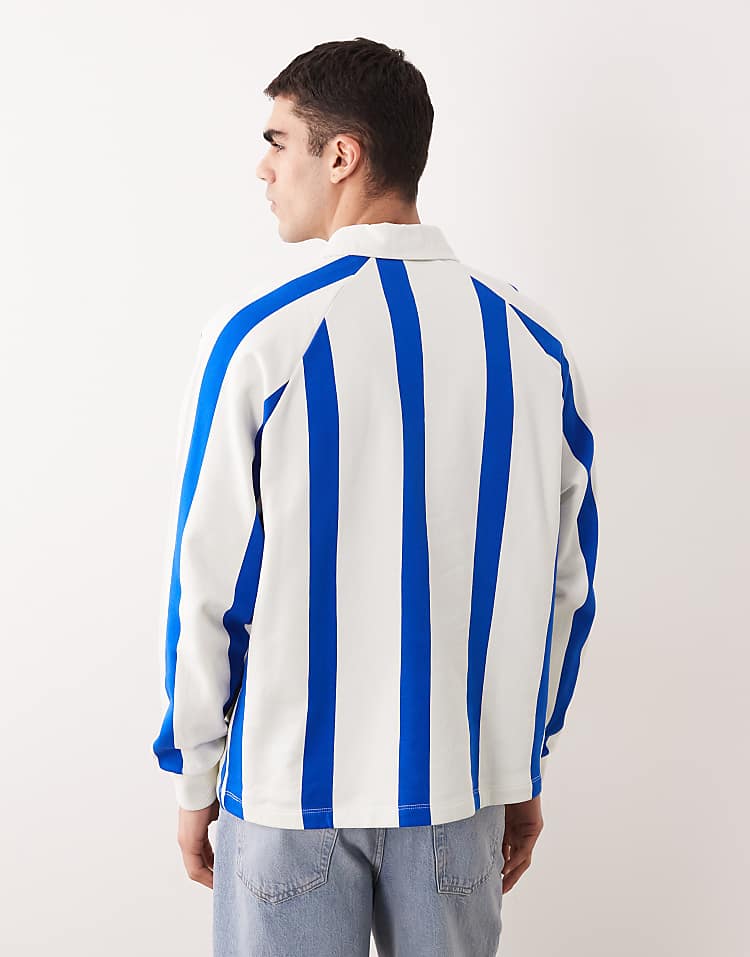 https://images.asos-media.com/products/asos-design-relaxed-rugby-sweatshirt-with-navy-vertical-stripes-in-navy/210261798-5?$n_750w$&wid=750&fit=constrain