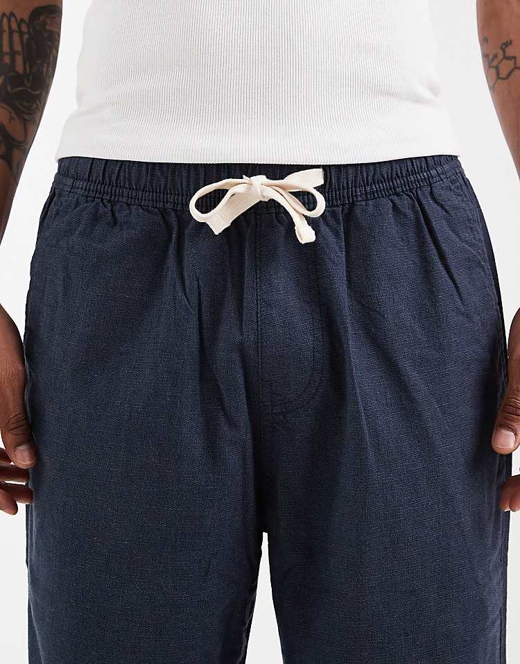 https://images.asos-media.com/products/hollister-cotton-linen-blend-loose-fit-trousers-in-navy/210474365-4?$n_750w$&wid=750&fit=constrain