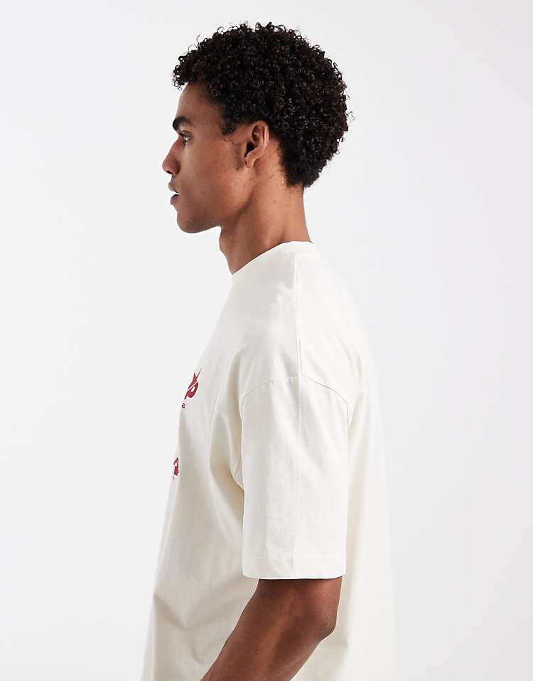 https://images.asos-media.com/products/asos-design-oversized-t-shirt-with-football-placement-in-off-white/210521602-5?$n_750w$&wid=750&fit=constrain